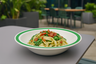 Emerald Green Duo Bowl with Pasta Dish in Outdoor Setting