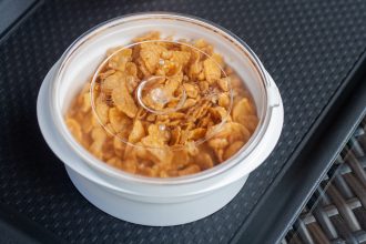 Cereal in White Dish with Handles and Lid