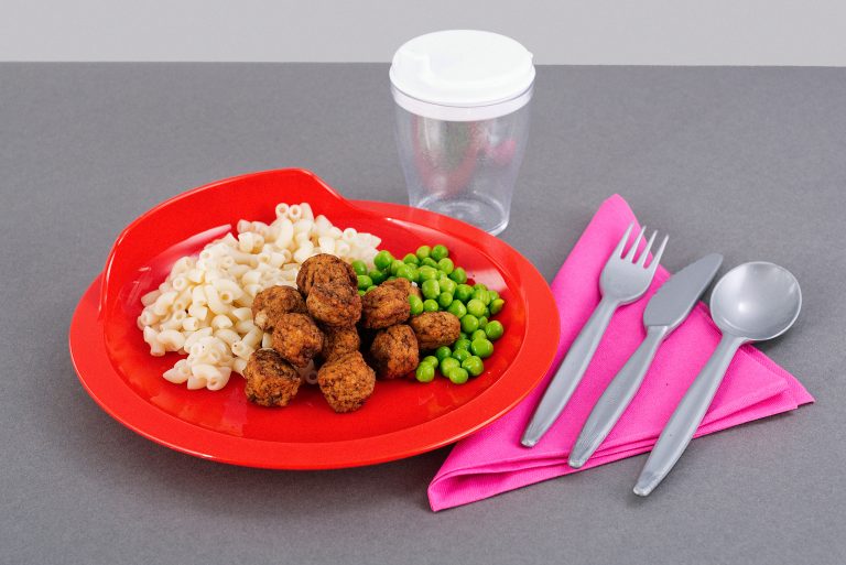Dinner Served on Red Assisted Living Plate
