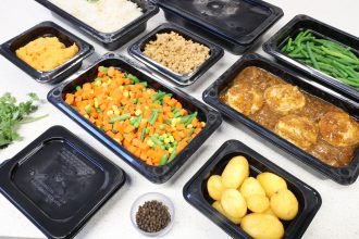 Charcoal Gastronorms and Lids in use with cooked food