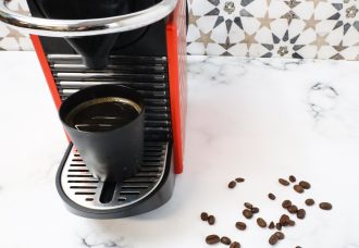 Espresso Cup in Use with Coffee Machine